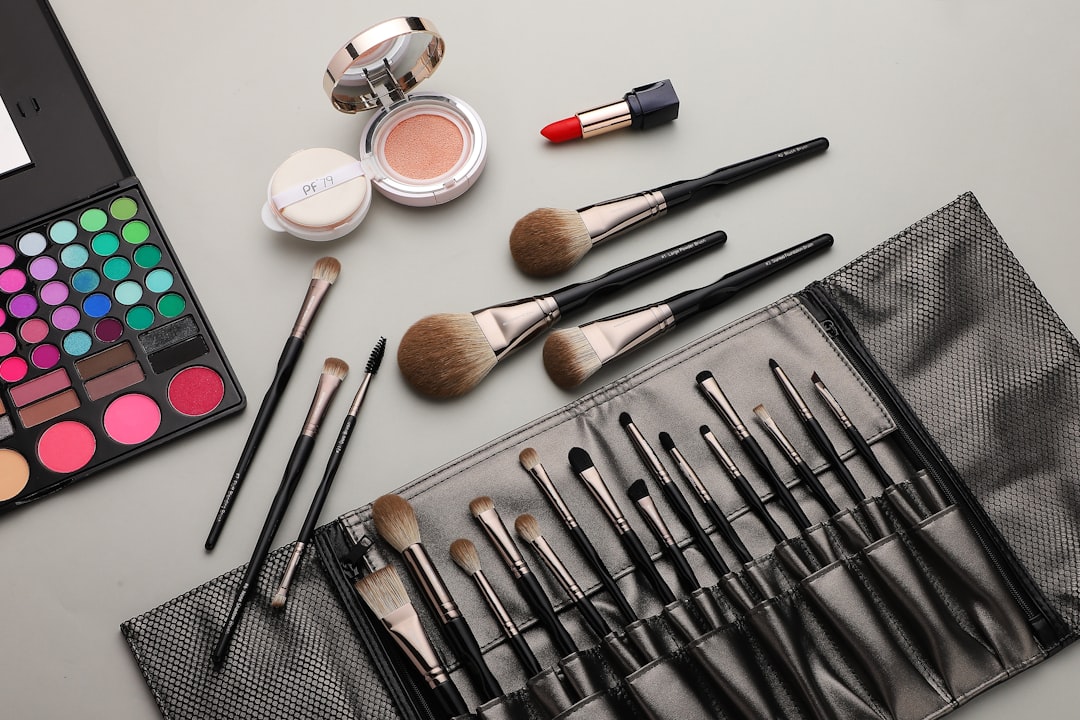 A set of essential contour brushes arranged on a vanity with makeup products in the background.